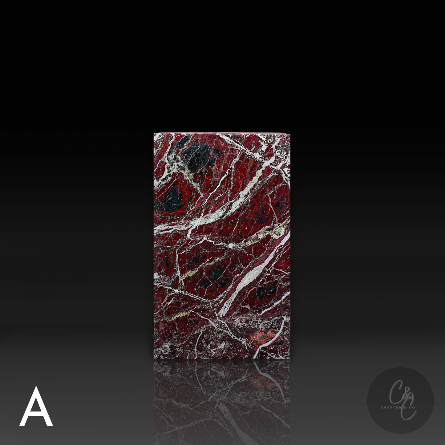 Front view of Rosso Levanto marble column side table showcasing rich natural veining and sculptural design.