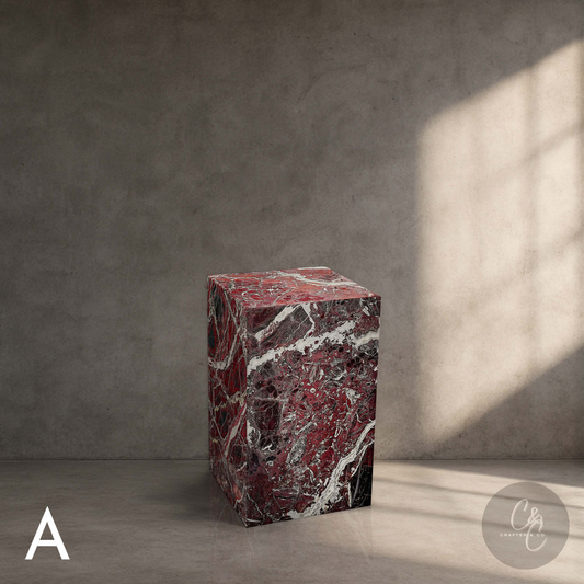 Rosso Levanto marble column side table in honed finish featuring bold burgundy tones and dramatic white veining.