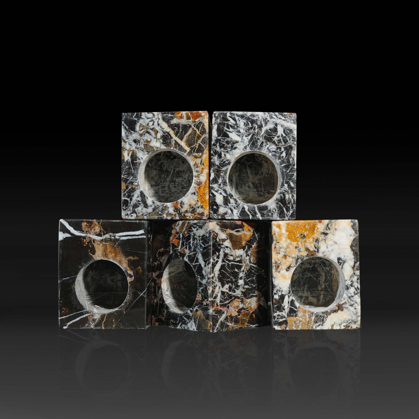 Handcrafted Black and Gold Marble oil burner sets styled in a modern interior.