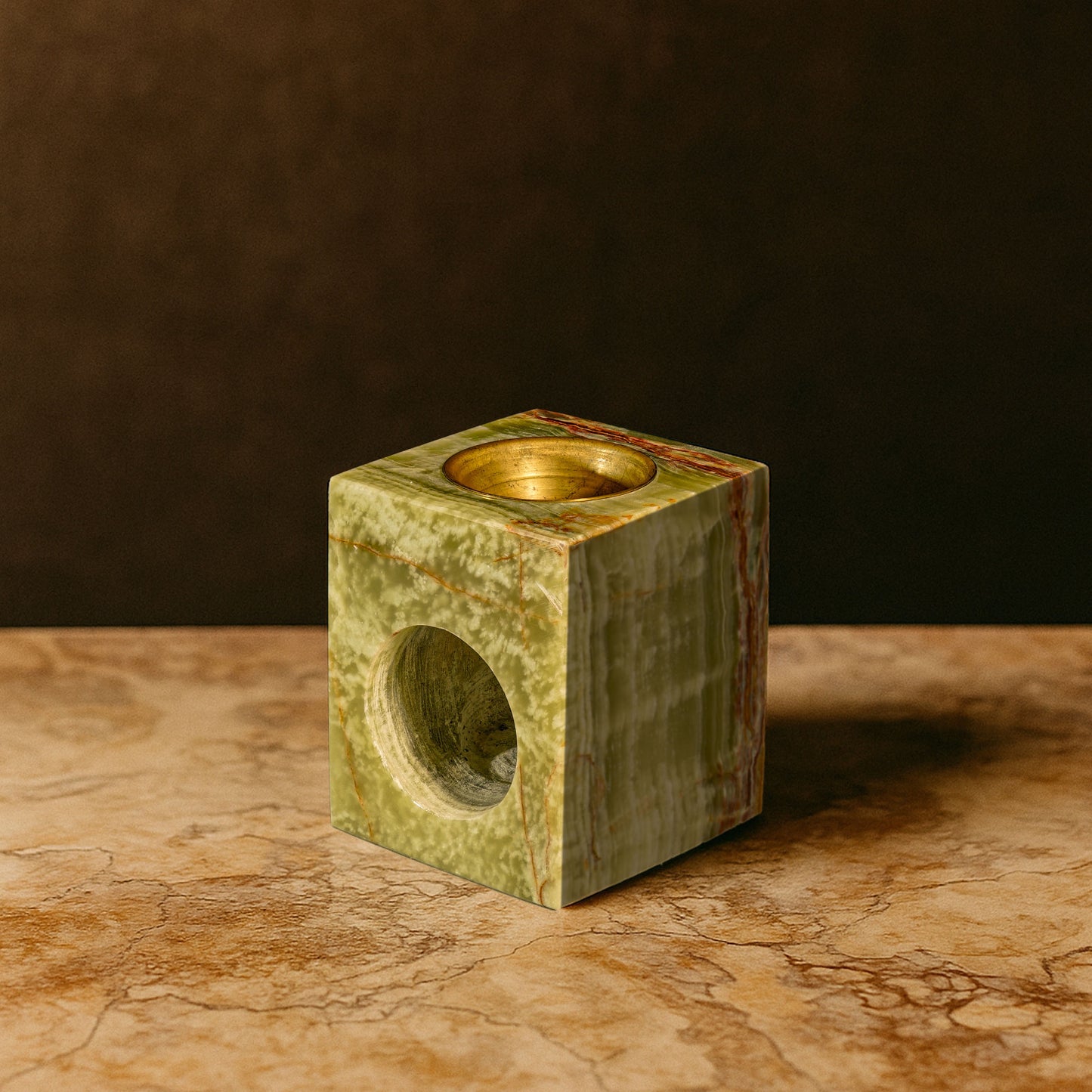 Serene Green Onyx oil burner handcrafted from natural polished onyx displayed on a stone surface.