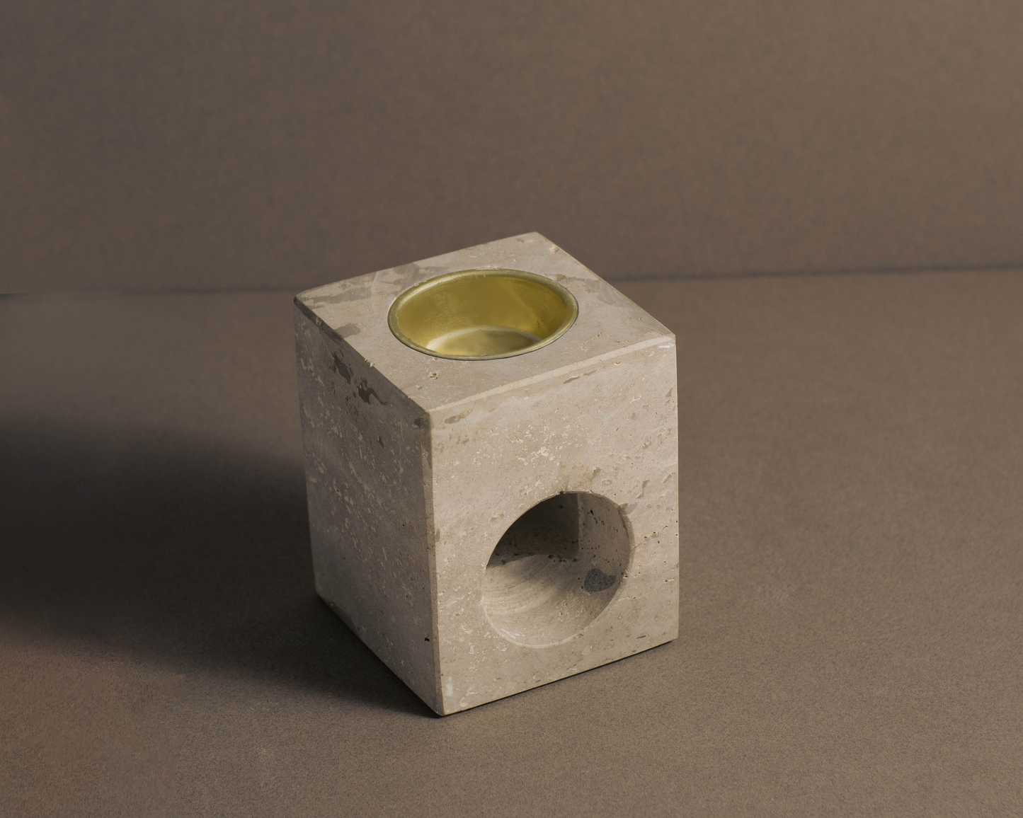 Luxury travertine oil burner for modern home decor.