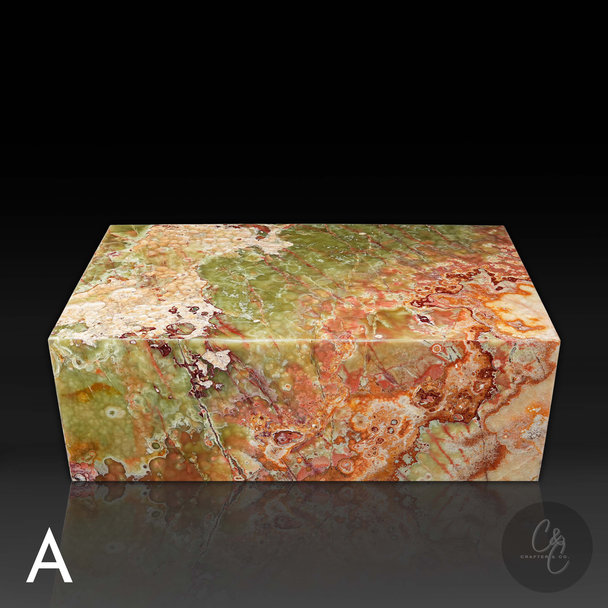 Front view of Small Block Green Onyx Coffee Table A handcrafted polished natural green onyx stone coffee table with striking multicolor veining.