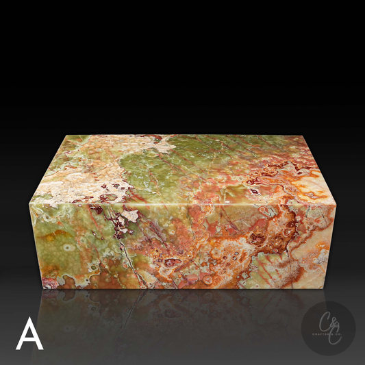 Front view of Small Block Green Onyx Coffee Table A handcrafted polished natural green onyx stone coffee table with striking multicolor veining.