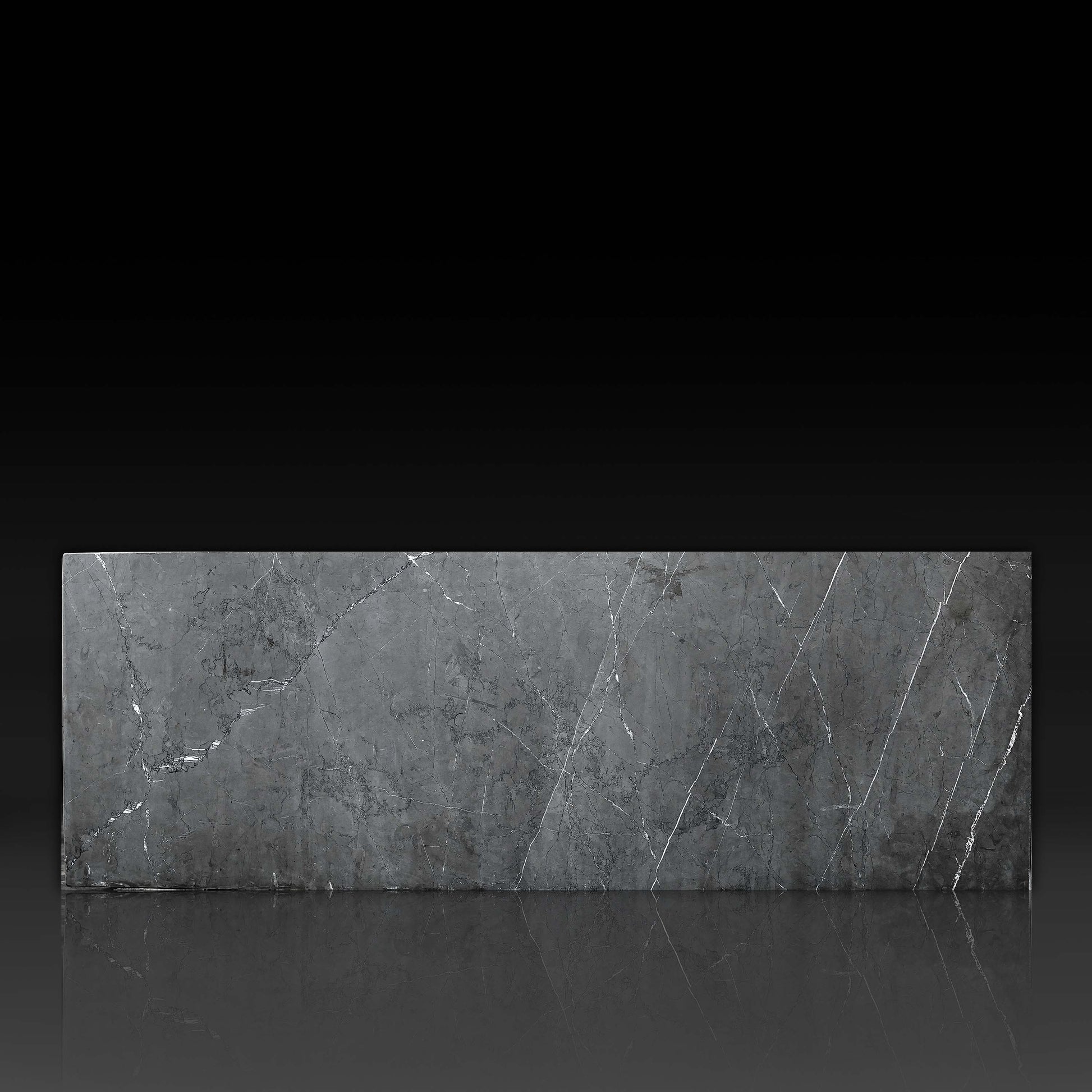 Front profile of Small Block Nero Marquina Grey Marble Coffee Table featuring natural grey marble with white veining and handcrafted stone finish