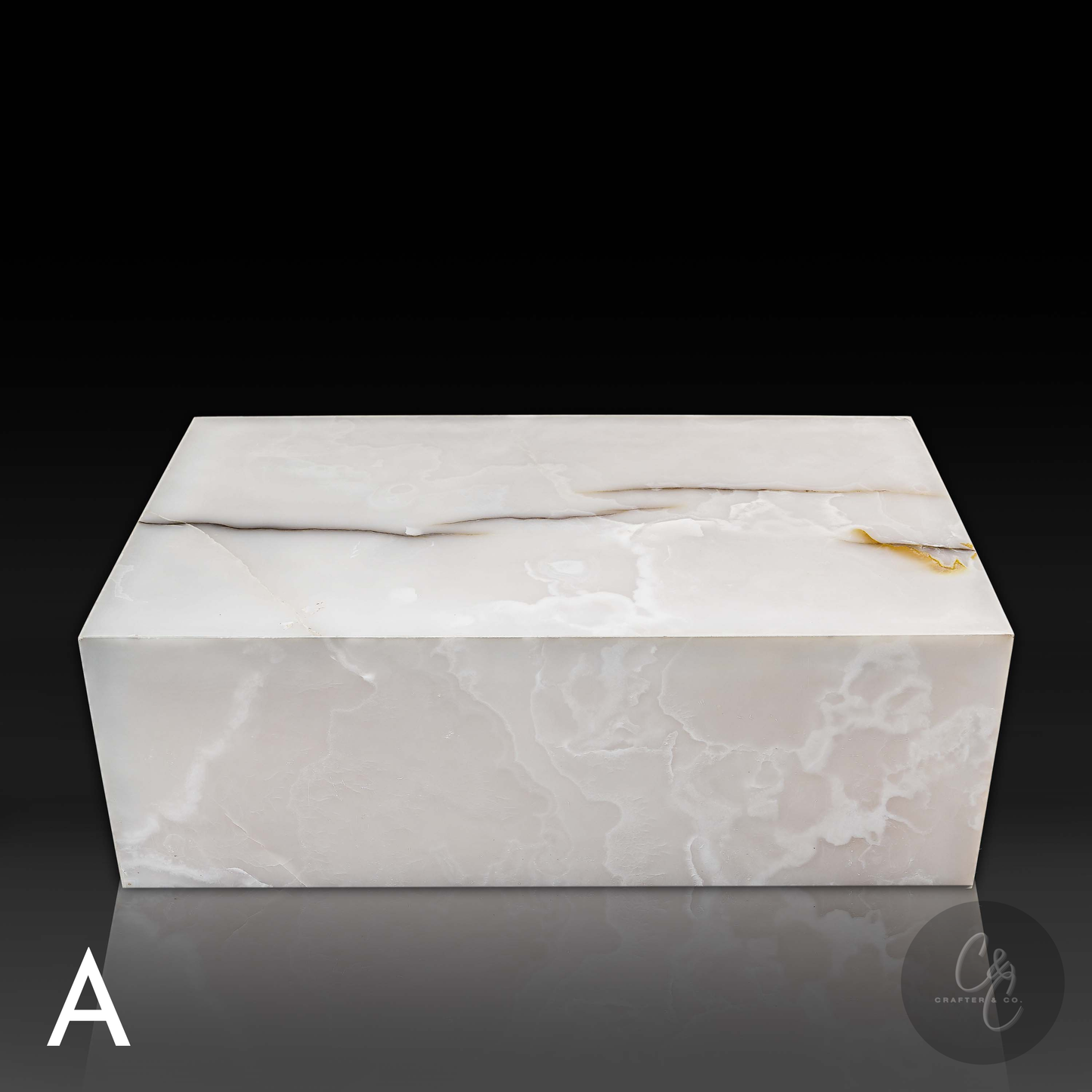 Close front view of Small Block White Onyx Coffee Table in premium natural white onyx with polished finish