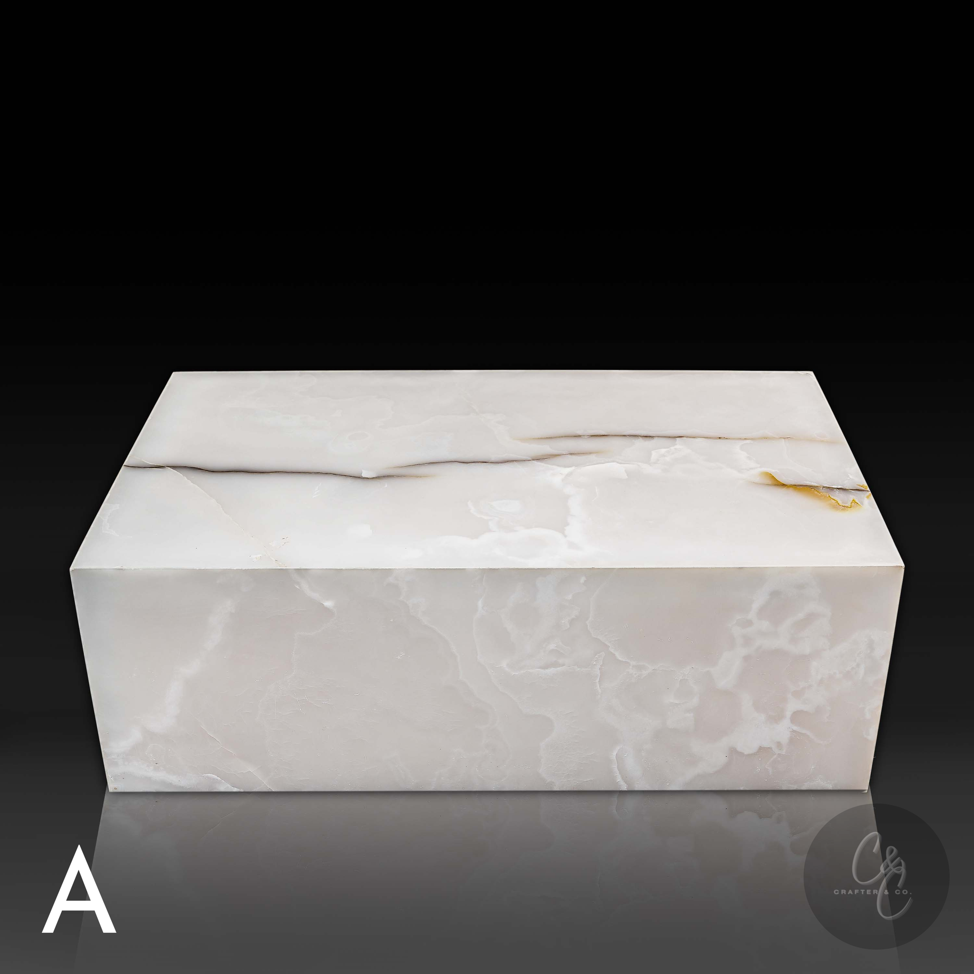 Close front view of Small Block White Onyx Coffee Table in premium natural white onyx with polished finish
