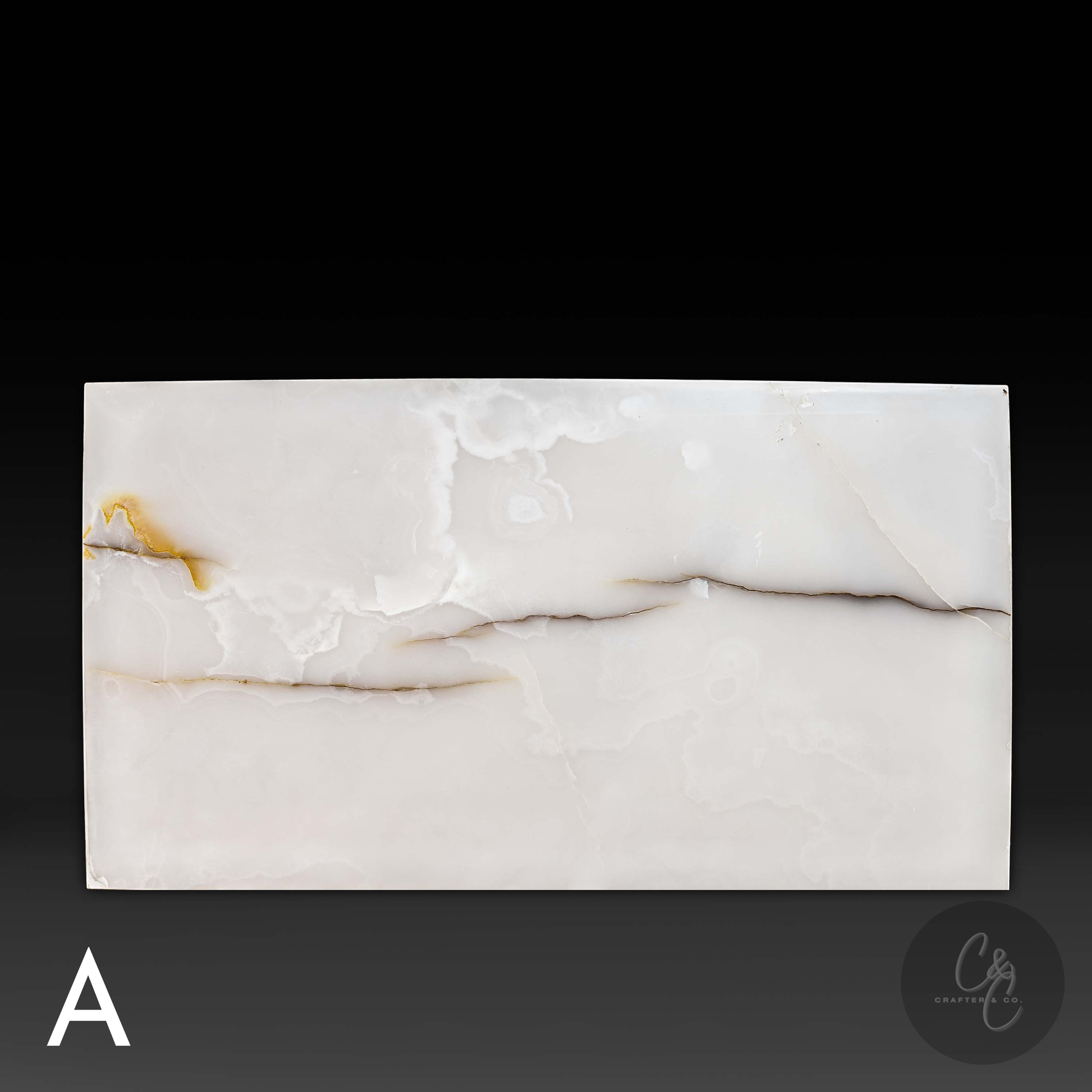 Top view of Small Block White Onyx Coffee Table showcasing natural white onyx veining and polished finish.
