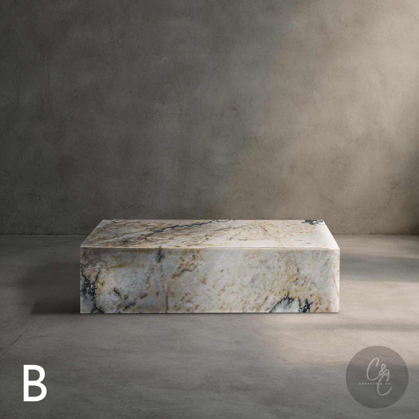 Small Calacatta Monet marble coffee table in honed finish with natural white, gold and grey veining.(Variation B)