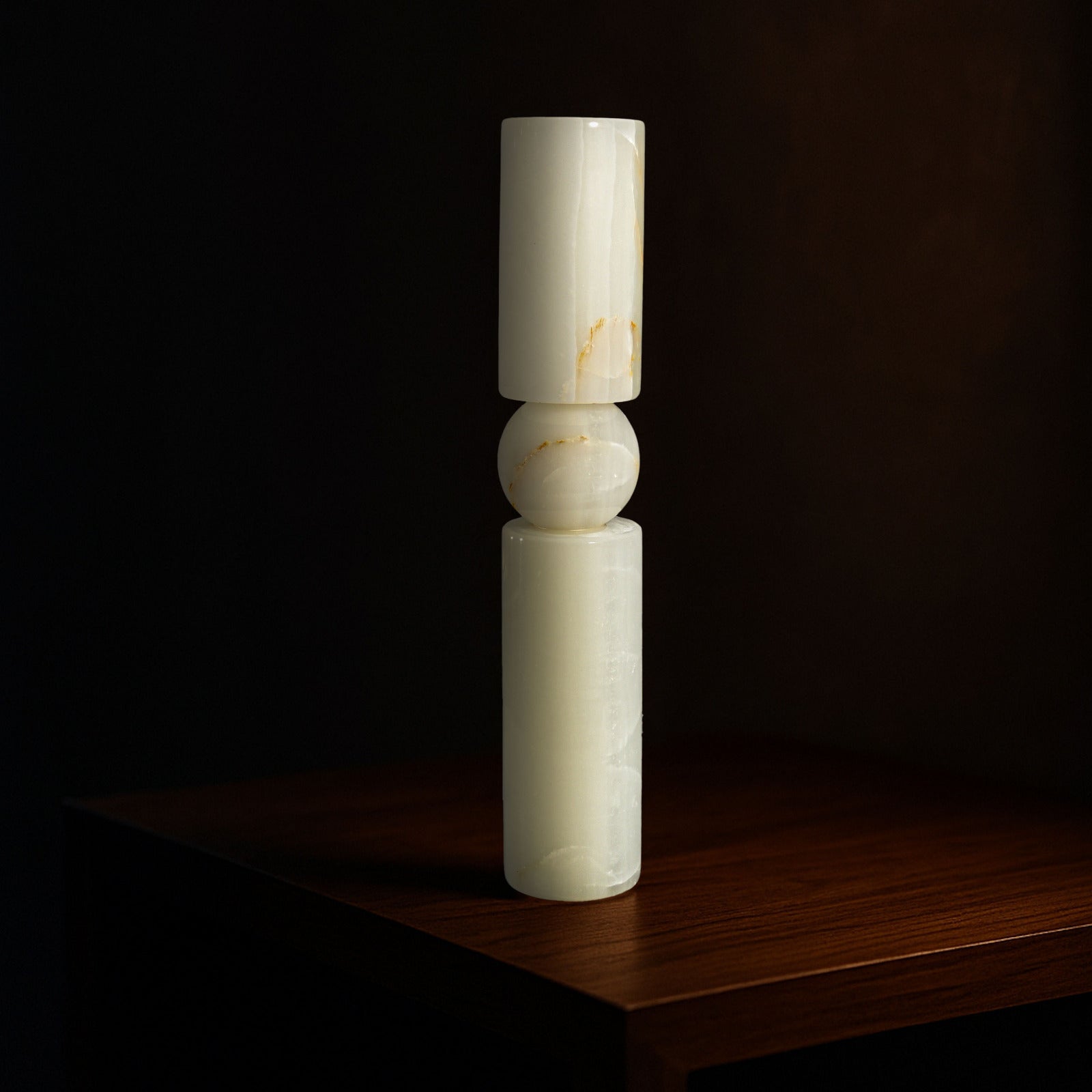 Solis natural stone candle holder in White Onyx with a sculptural modern design.