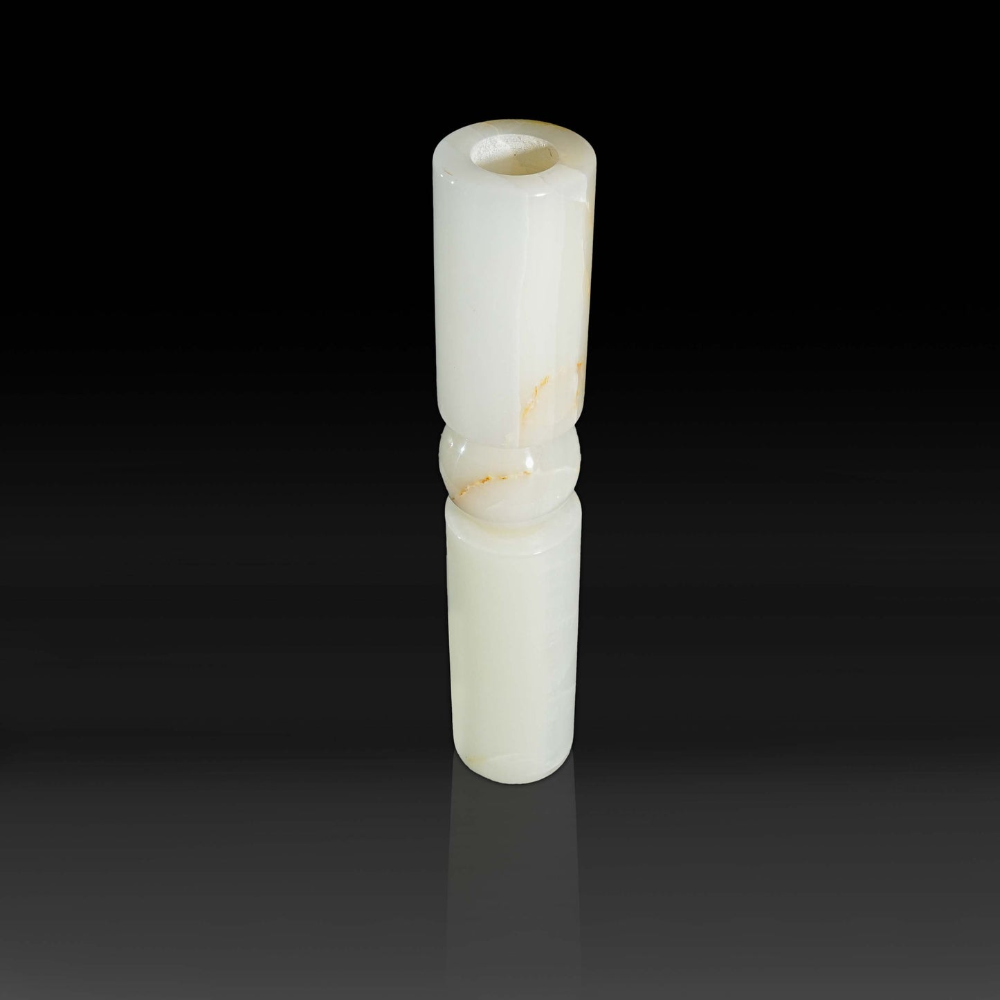 Top view of Solis White Onyx natural stone candle holder with sculptural modern design.