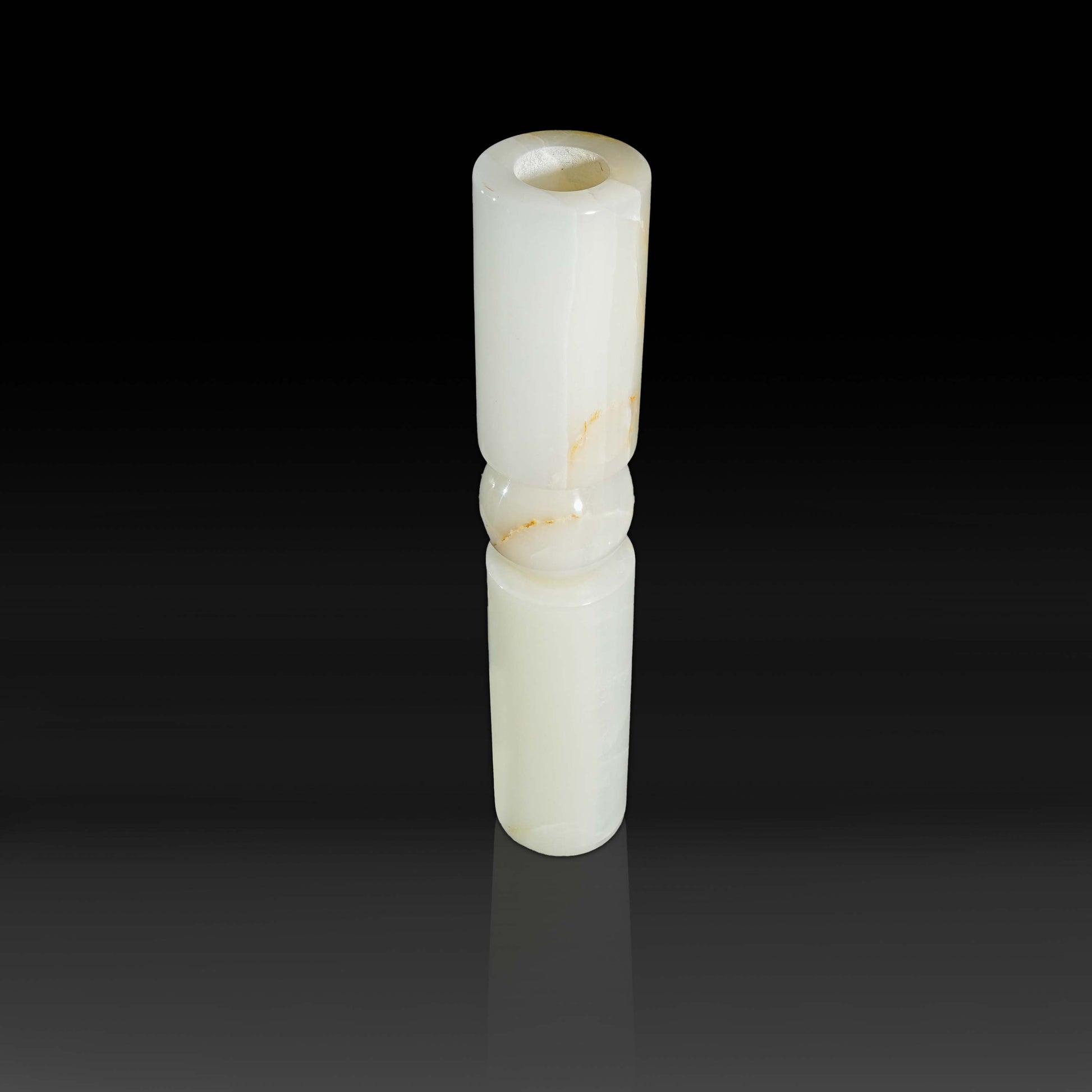 Top view of Solis White Onyx natural stone candle holder with sculptural modern design.