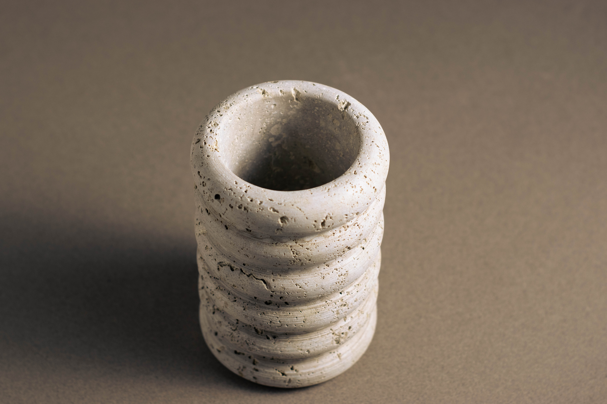 Top view of Tidal Travertine Vase handcrafted from genuine natural travertine.