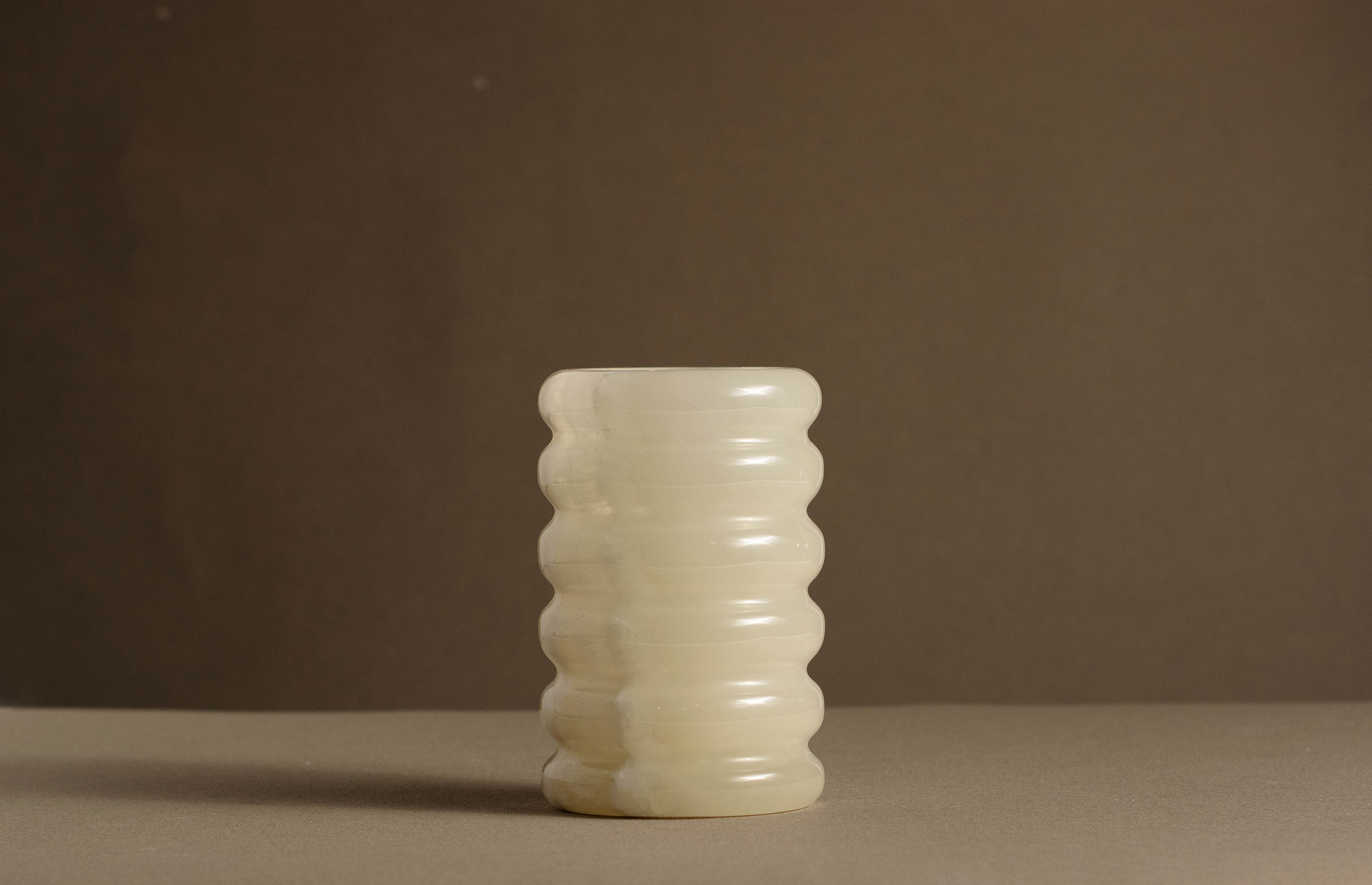 Tidal White Onyx Vase handcrafted from solid natural white onyx.
