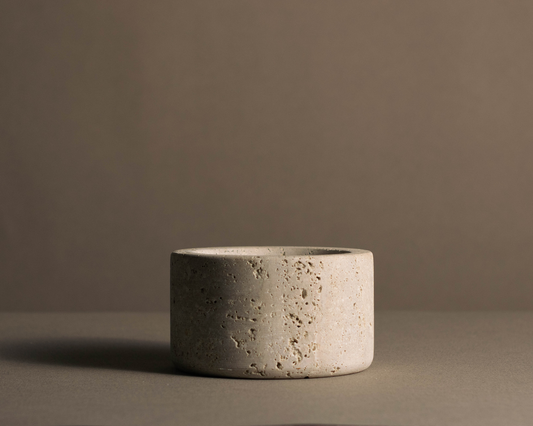 Handcrafted natural travertine bowl with a smooth honed finish for serving snacks, displaying décor, or everyday styling.