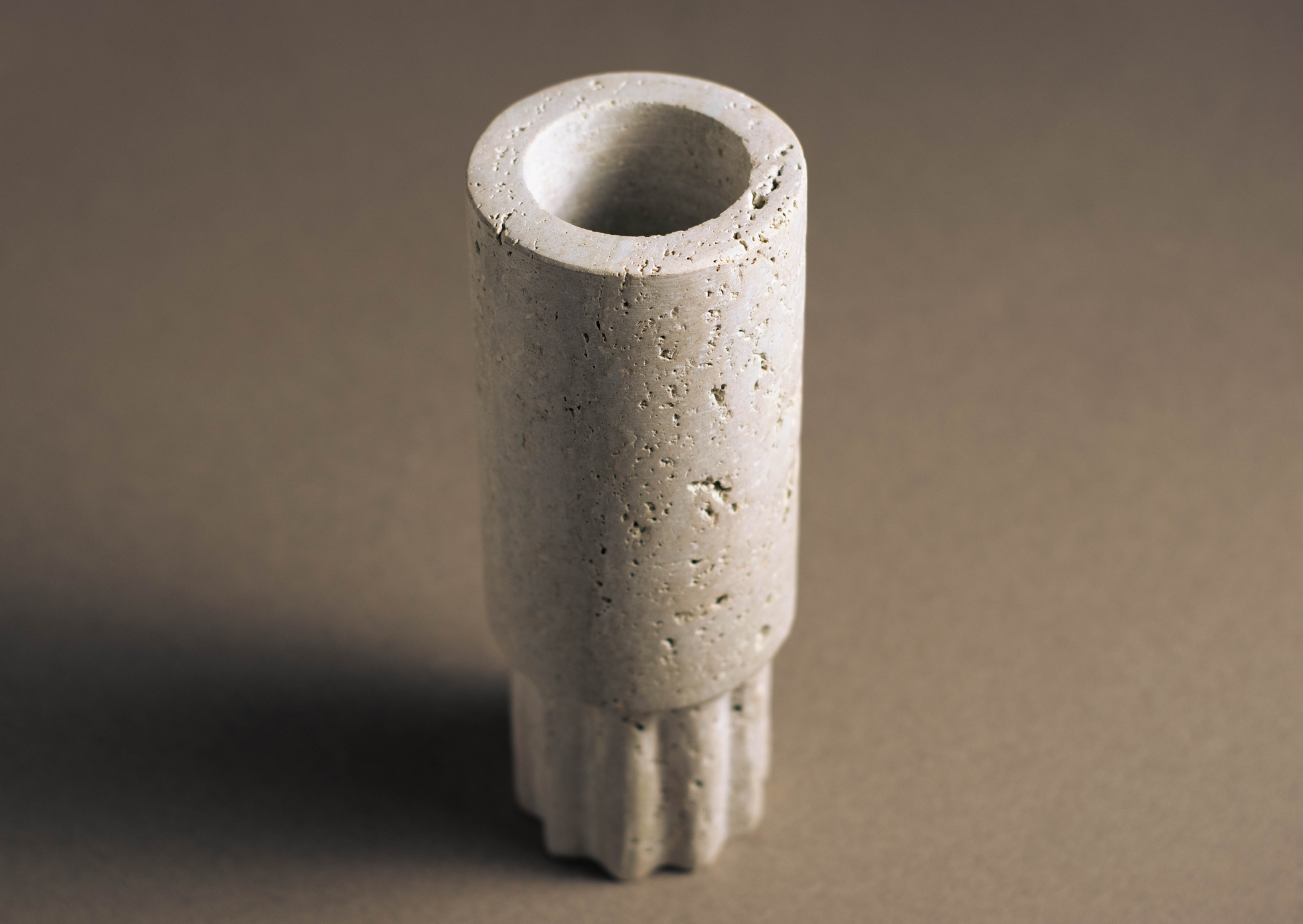 Travertine Column Vase top angle natural travertine decorative vase.