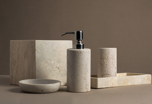 Travertine Luxe Bathroom Accessories Set with soap dispenser, tray, tumbler, tissue box and soap dish.
