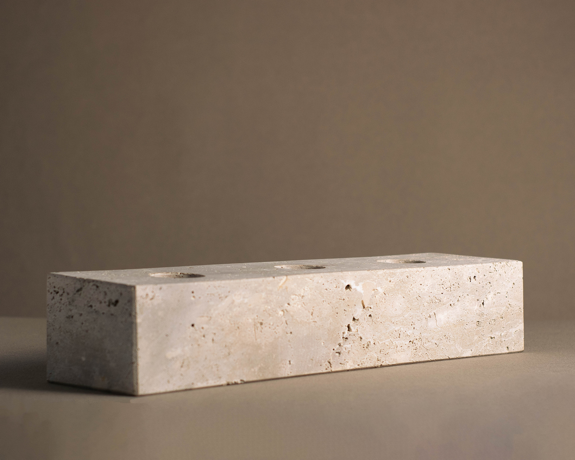 Travertine Tealight Candle Holder side angle handcrafted natural stone candle holder.