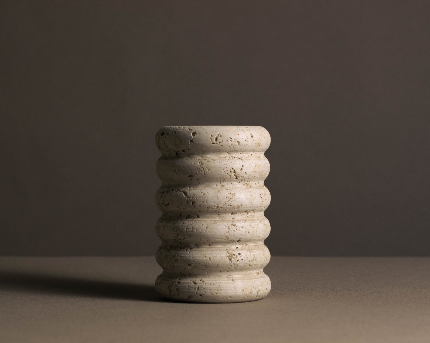 Travertine Tidal Vase handcrafted from natural stone for modern home décor.