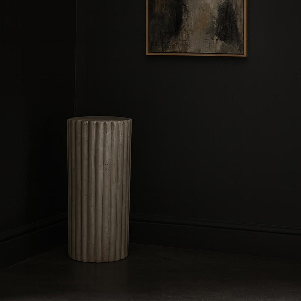 Verona Fluted Travertine Plinth handcrafted from premium natural travertine featuring a sculptural fluted design in a modern interior.