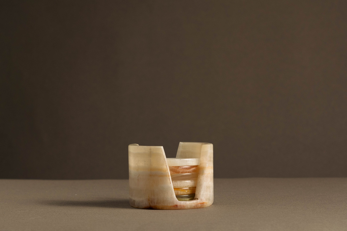 White Onyx Murmor Coaster Set with Holder handcrafted from natural stone.