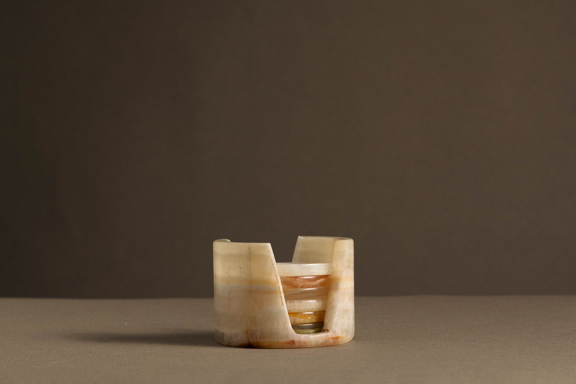 White Onyx Murmor Coaster Set with Holder handcrafted from natural stone.